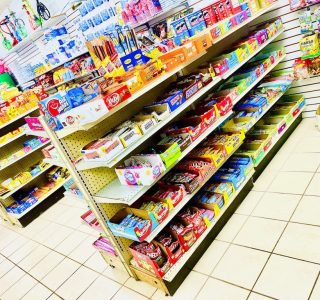 A store interior showcasing a diverse array of products on shelves and displays.